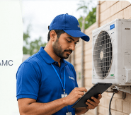 Technician servicing HVAC with field tablet